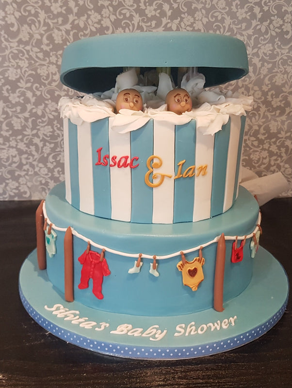 Peek-a-boo and clothes-line baby shower cake