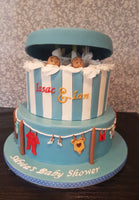 Peek-a-boo and clothes-line baby shower cake