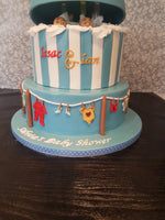 Peek-a-boo and clothes-line baby shower cake