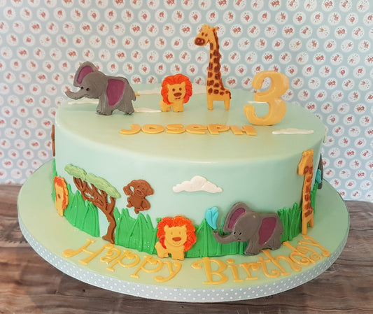 Jungle animals themed birthday cake