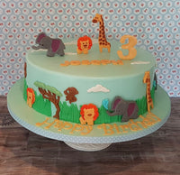 Jungle animals themed birthday cake