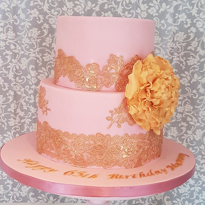 Pink and gold lace fondant cake