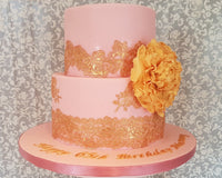 Pink and gold lace fondant cake
