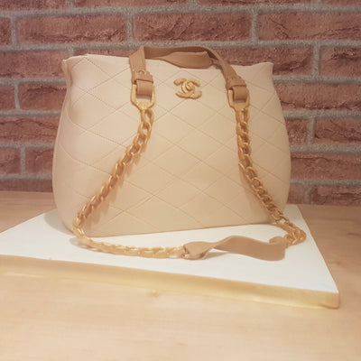 Cream Chanel bag cake