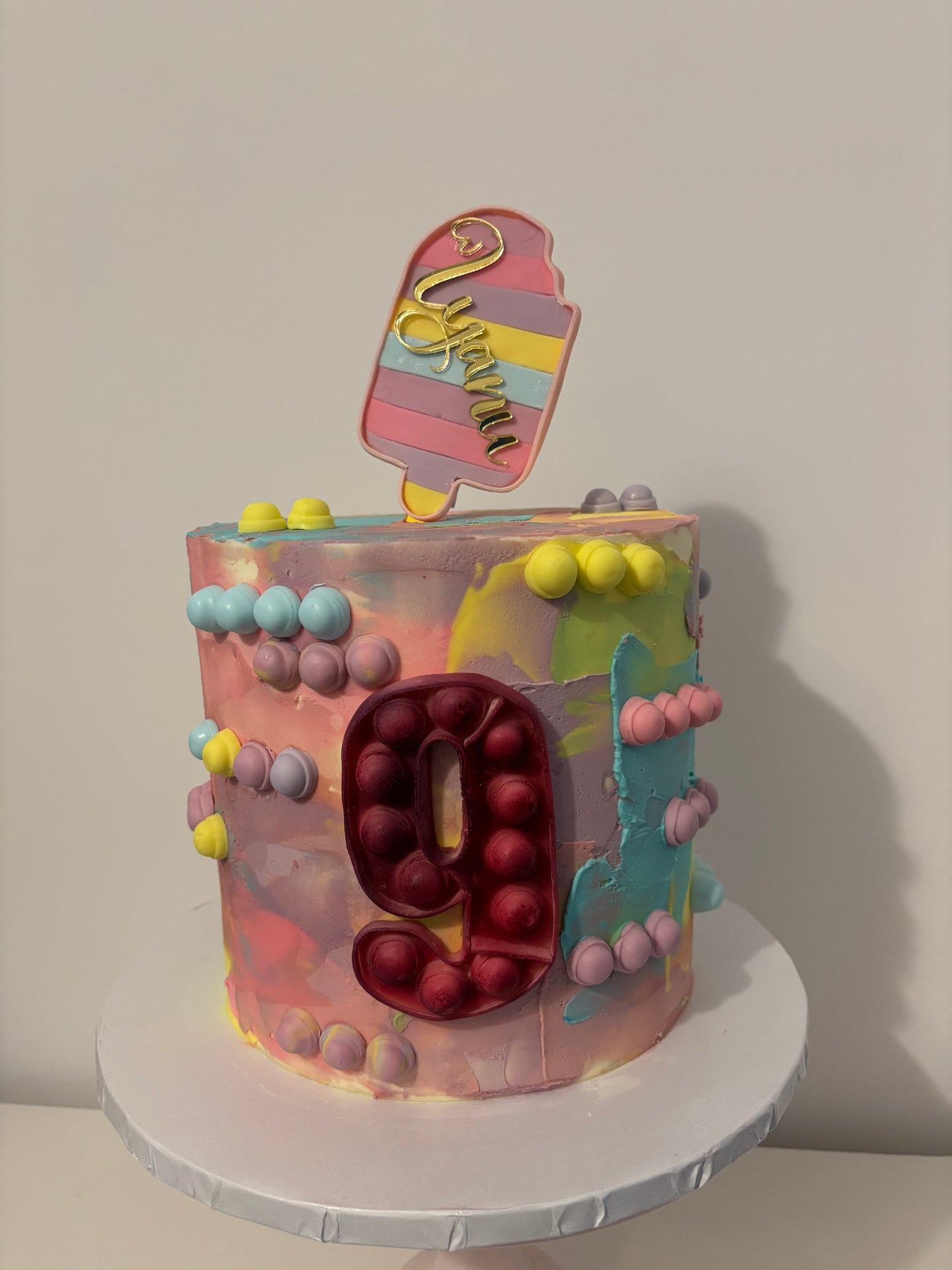 Colourful pop it fidget cake