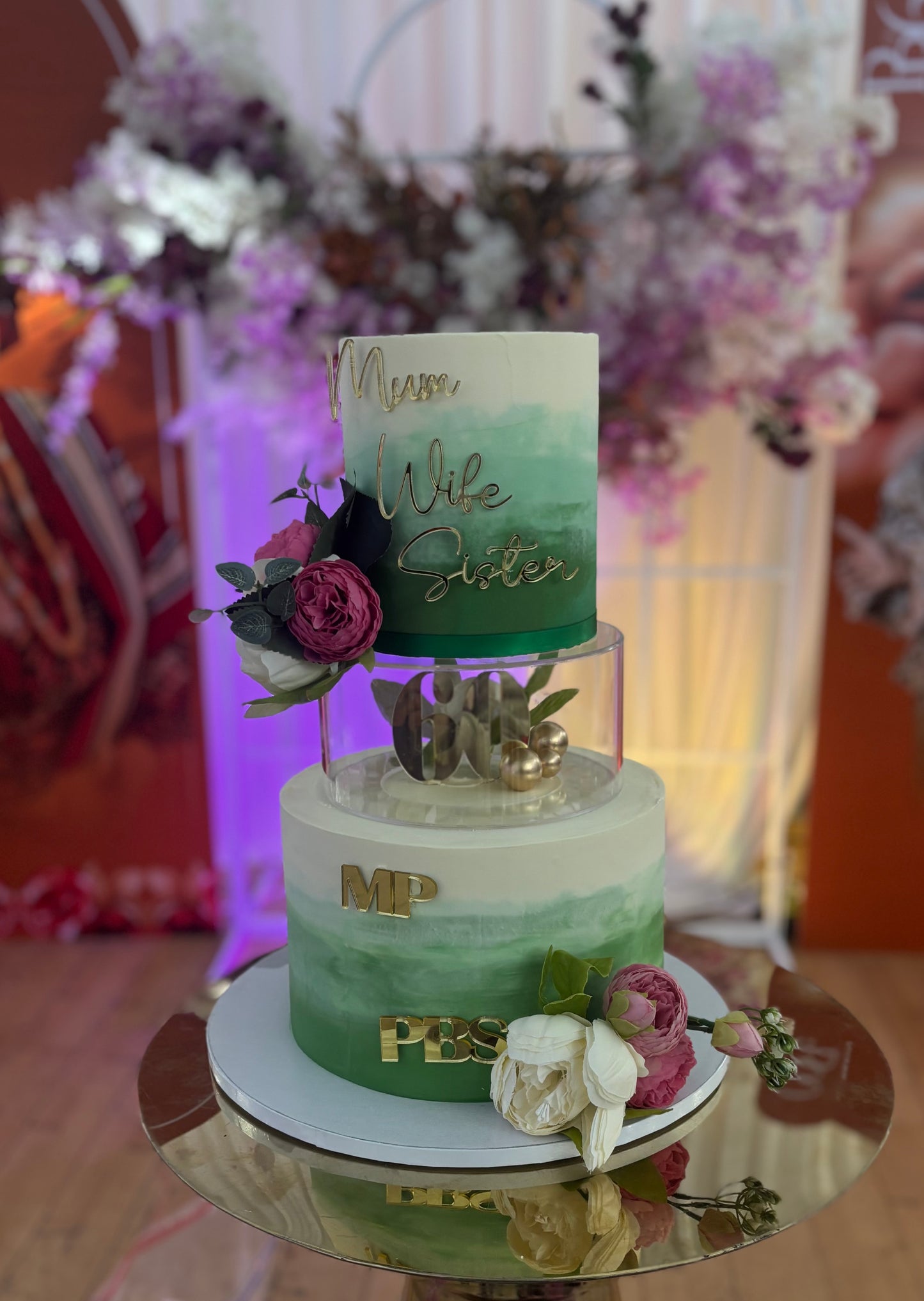 Tiered cake with clear acrylic tier