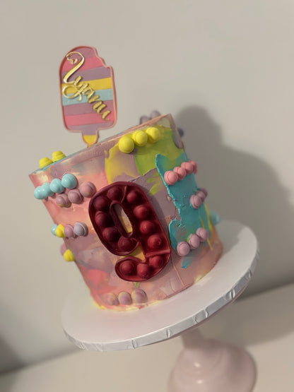 Colourful pop it fidget cake