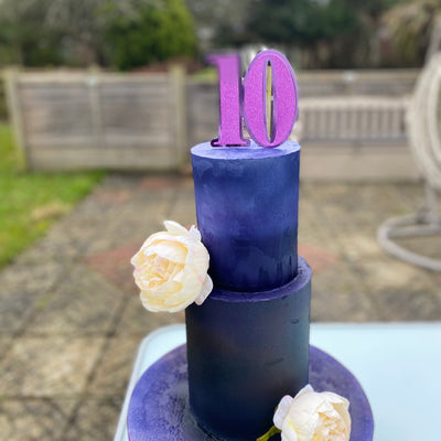 Black cake with purple accents