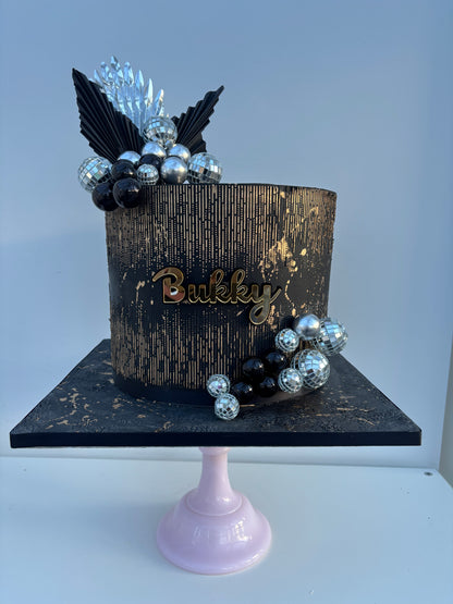 Black and gold shimmer cake