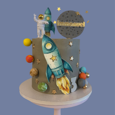 Space and rockers themed cake