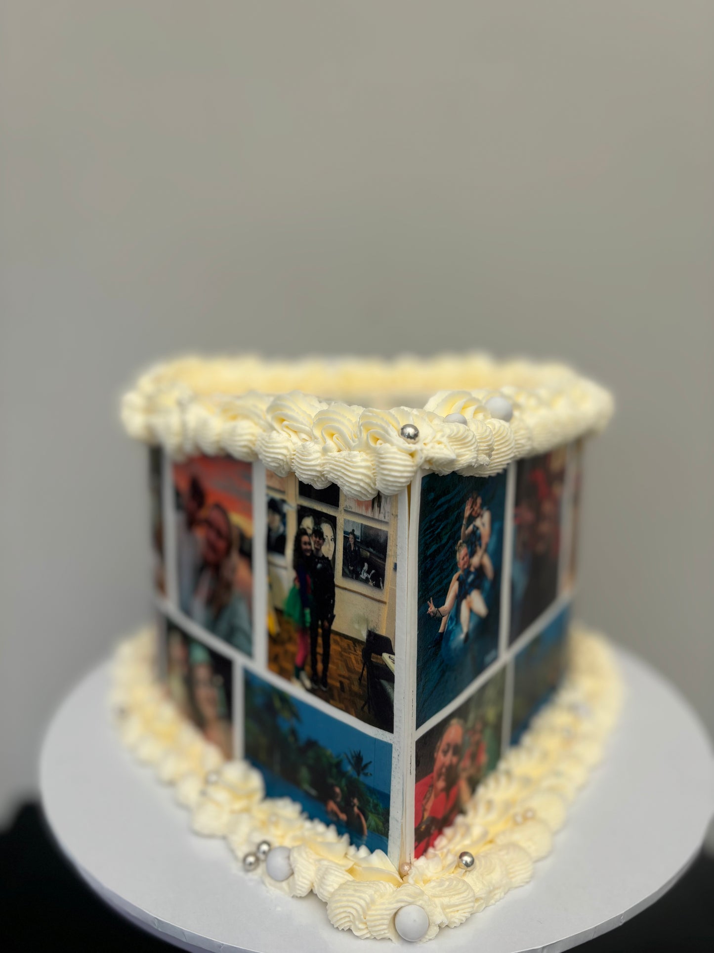 Heart-shaped cake with edible photos