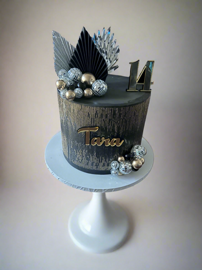 Black and gold shimmer cake