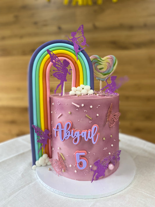 Butterflies, fairies and rainbow buttercream cake