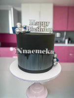 Black and silver buttercream cake