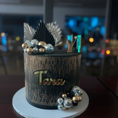 Black and gold shimmer cake