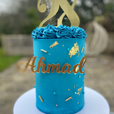 Deep blue and gold cake