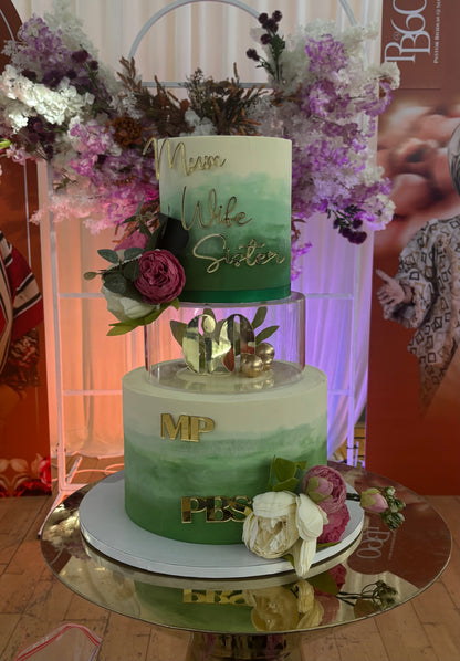 Tiered cake with clear acrylic tier