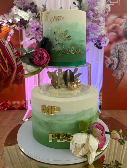 Tiered cake with clear acrylic tier