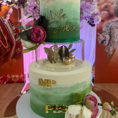 Tiered cake with clear acrylic tier