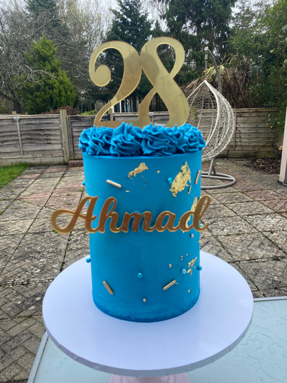 Deep blue and gold cake