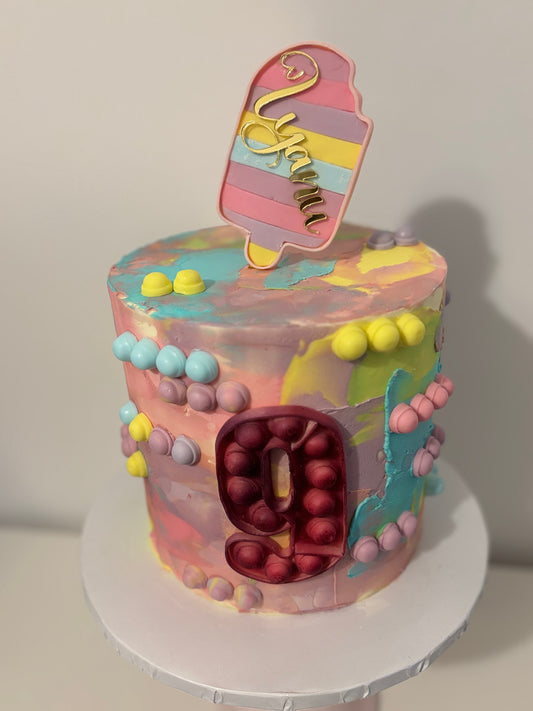 Colourful pop it fidget cake