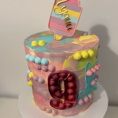 Colourful pop it fidget cake