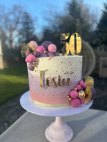 Cream, pink and purple ombre cake