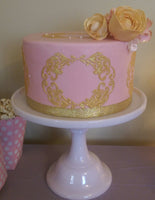 Pink fondant cake with sugar flowers
