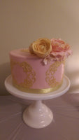 Pink fondant cake with sugar flowers